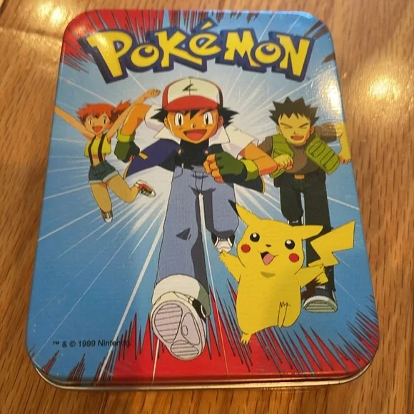 Vintage Pokemon Tin w/playing cards & Classic Collectors Handbook